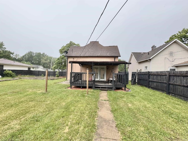 808 19th St, Logansport, IN 46947 - rear view of house featuring a fenced backyard and a wooden deck