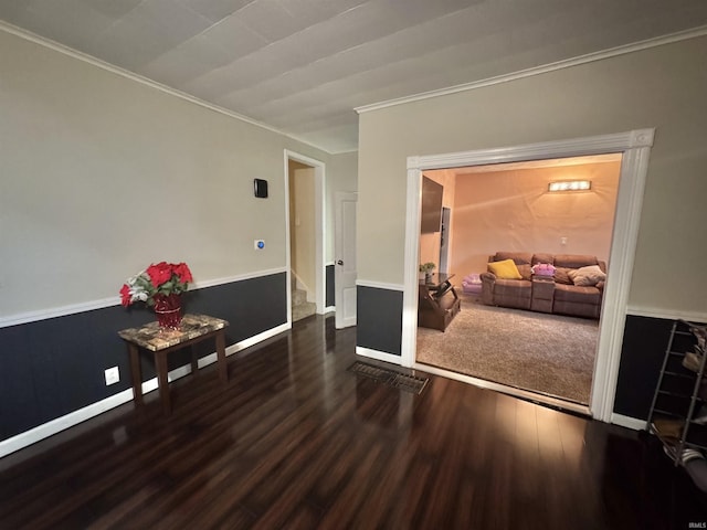 808 19th St, Logansport, IN 46947 - unfurnished room with wood finished floors, ornamental molding, and stairway