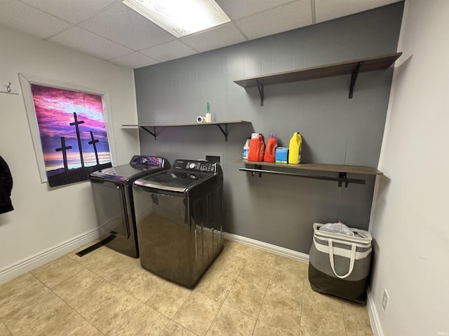808 19th St, Logansport, IN 46947 - washroom with washing machine and dryer and light tile patterned flooring