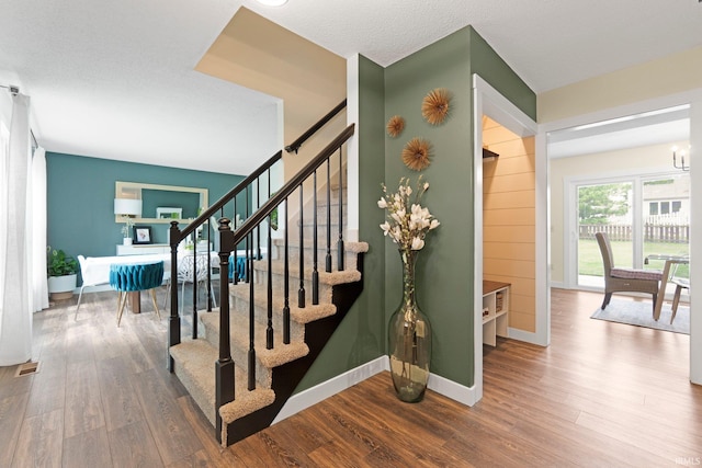 10729 Lone Tree Pl, Fort Wayne, IN 46818 - stairs featuring wood finished floors