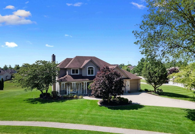 1106 Woodland Xing, Fort Wayne, IN 46825 - traditional-style house with driveway, a front yard, an attached garage, and a chimney