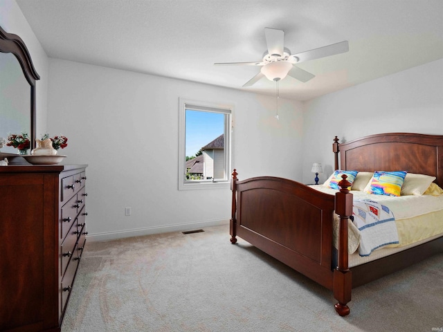 1106 Woodland Xing, Fort Wayne, IN 46825 - bedroom with light colored carpet and a ceiling fan