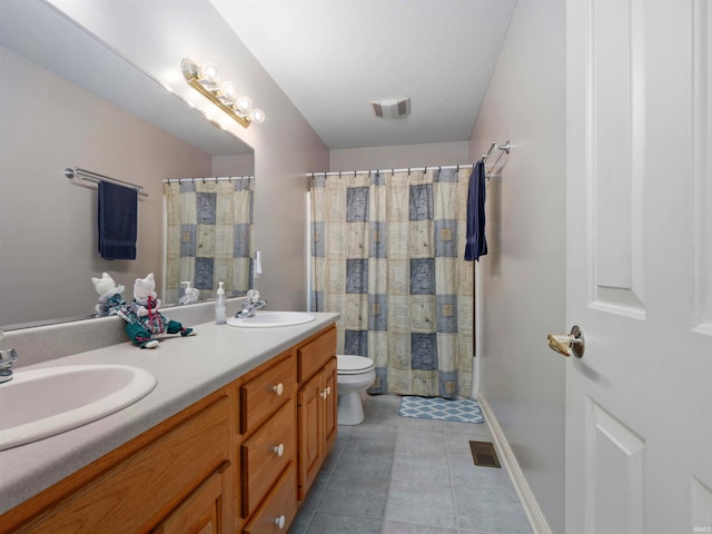 1106 Woodland Xing, Fort Wayne, IN 46825 - full bath with double vanity, tile patterned floors, and a shower with curtain