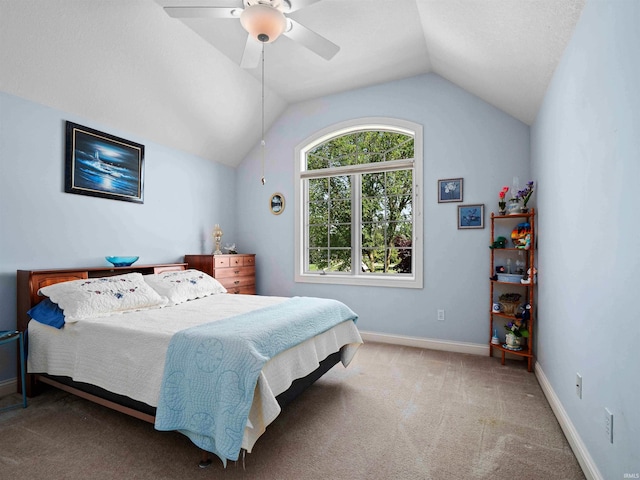 1106 Woodland Xing, Fort Wayne, IN 46825 - bedroom with lofted ceiling, carpet floors, and ceiling fan