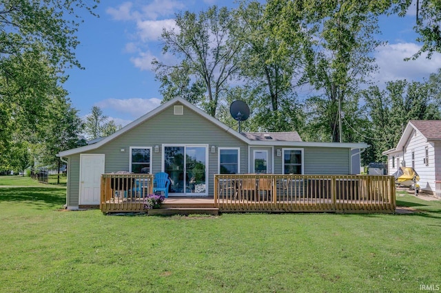 0175 Frantz Dr, Wawaka, IN 46794 - back of property with a deck and a lawn
