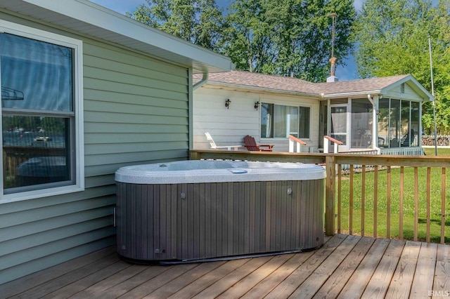 0175 Frantz Dr, Wawaka, IN 46794 - wooden terrace featuring a hot tub, a sunroom, and a lawn