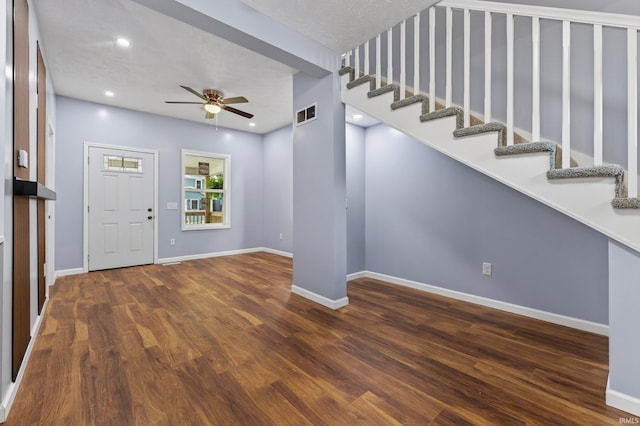 669 W Lexington Ave, Elkhart, IN 46514 - entryway with ceiling fan, wood finished floors, stairway, and recessed lighting