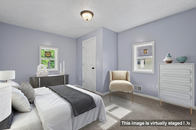 669 W Lexington Ave, Elkhart, IN 46514 - carpeted bedroom with baseboards