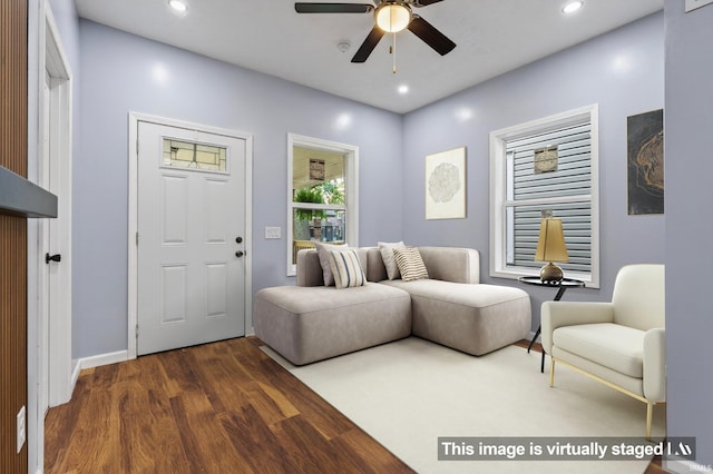 669 W Lexington Ave, Elkhart, IN 46514 - living room with dark wood-style flooring, ceiling fan, and recessed lighting