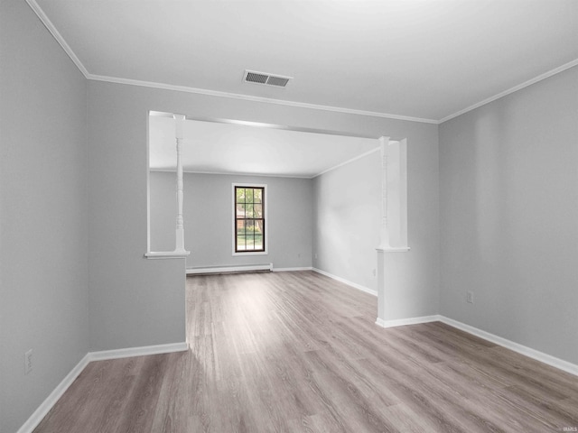 6506 Woodthrush Dr, Fort Wayne, IN 46835 - empty room featuring baseboard heating, wood finished floors, and ornamental molding