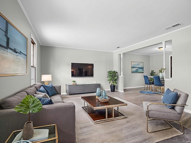 6506 Woodthrush Dr, Fort Wayne, IN 46835 - living room featuring wood finished floors and ornamental molding