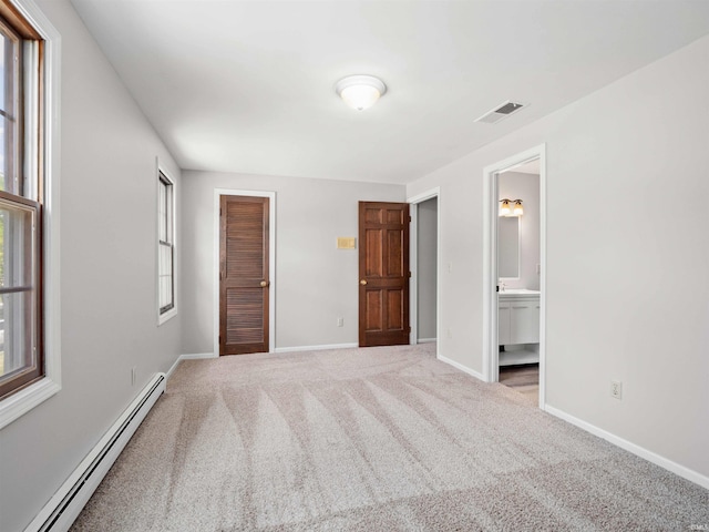 6506 Woodthrush Dr, Fort Wayne, IN 46835 - unfurnished bedroom featuring a baseboard radiator, carpet floors, a closet, and ensuite bathroom