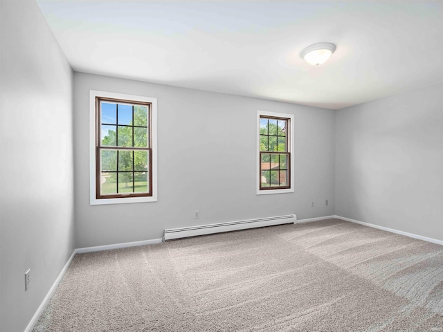 6506 Woodthrush Dr, Fort Wayne, IN 46835 - carpeted empty room featuring a baseboard radiator and baseboards
