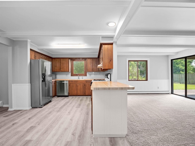 6506 Woodthrush Dr, Fort Wayne, IN 46835 - kitchen with stainless steel appliances, brown cabinets, beam ceiling, a peninsula, and wainscoting
