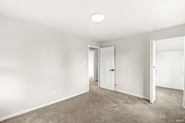 533 Altgeld St, South Bend, IN 46614 - unfurnished bedroom with carpet, a closet, and a spacious closet