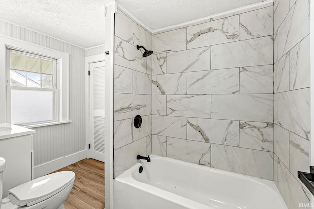 533 Altgeld St, South Bend, IN 46614 - full bath with wood finished floors, a textured ceiling,  shower combination, crown molding, and vanity