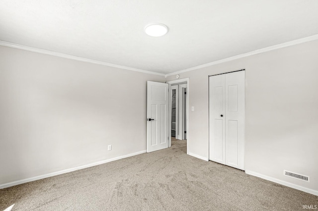 533 Altgeld St, South Bend, IN 46614 - unfurnished bedroom featuring carpet floors, crown molding, and a closet