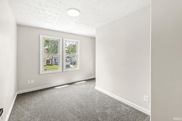 533 Altgeld St, South Bend, IN 46614 - unfurnished room with carpet and a textured ceiling