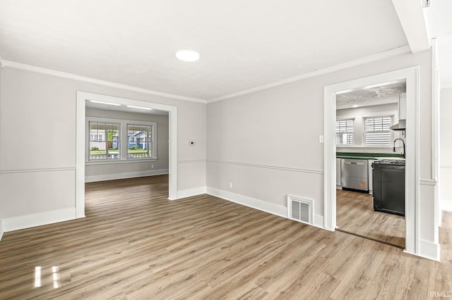 533 Altgeld St, South Bend, IN 46614 - unfurnished room with light wood-type flooring, plenty of natural light, and ornamental molding