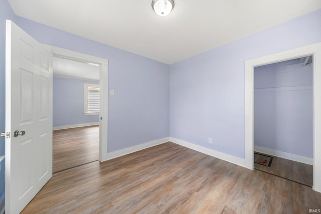 3014 Drexel Ave, Fort Wayne, IN 46806 - unfurnished bedroom featuring light wood finished floors and a closet