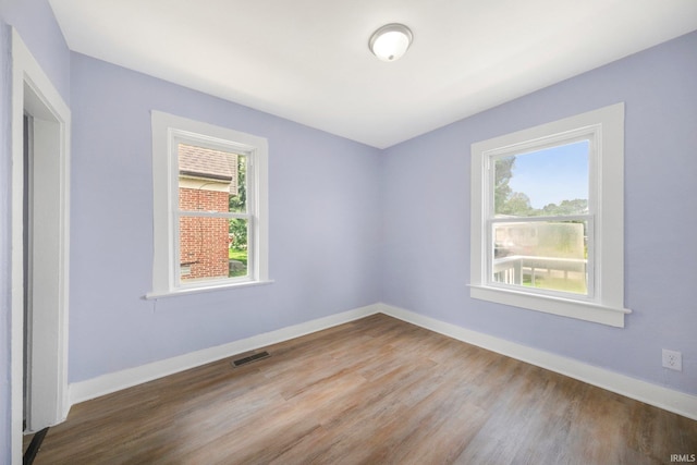 3014 Drexel Ave, Fort Wayne, IN 46806 - unfurnished room featuring wood finished floors and baseboards