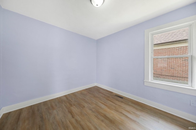 3014 Drexel Ave, Fort Wayne, IN 46806 - spare room with baseboards and wood finished floors