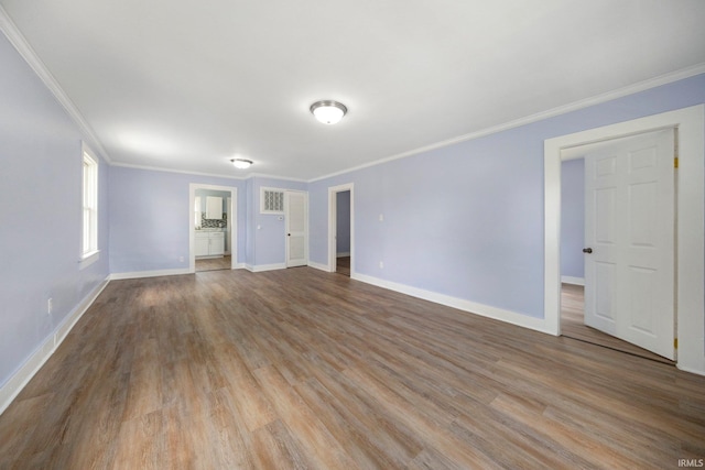 3014 Drexel Ave, Fort Wayne, IN 46806 - empty room featuring ornamental molding and wood finished floors