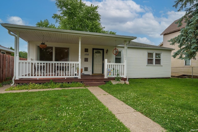 1712 Royal Center Pike, Logansport, IN 46947 - view of front facade with a porch