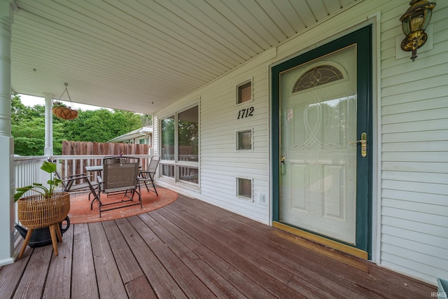 1712 Royal Center Pike, Logansport, IN 46947 - wooden deck featuring outdoor dining space
