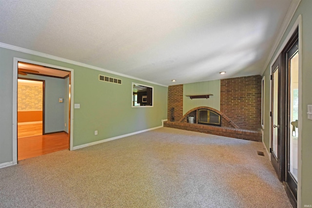 9818 Houndshill Pl, Fort Wayne, IN 46804 - unfurnished living room featuring carpet flooring, a fireplace, and crown molding