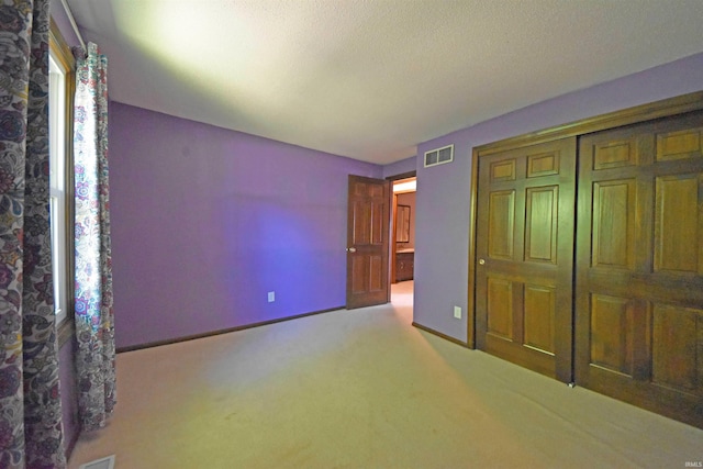 9818 Houndshill Pl, Fort Wayne, IN 46804 - unfurnished bedroom featuring carpet floors and a closet