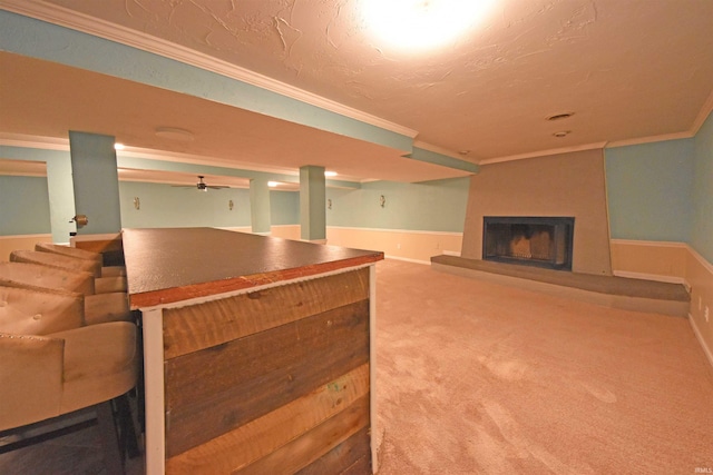 9818 Houndshill Pl, Fort Wayne, IN 46804 - carpeted living area with ornamental molding, a large fireplace, a ceiling fan, and a textured ceiling
