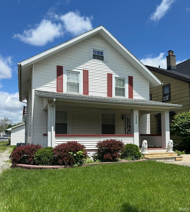 714 W Wildwood Ave, Fort Wayne, IN 46807 - view of front of property featuring a porch and a front lawn