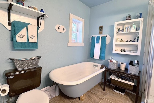 68615 County Road 23, New Paris, IN 46553 - full bath with a freestanding tub and tile patterned floors
