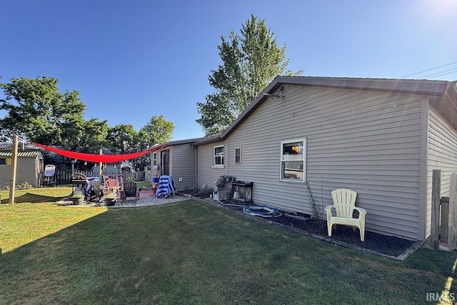 68615 County Road 23, New Paris, IN 46553 - back of house featuring a lawn