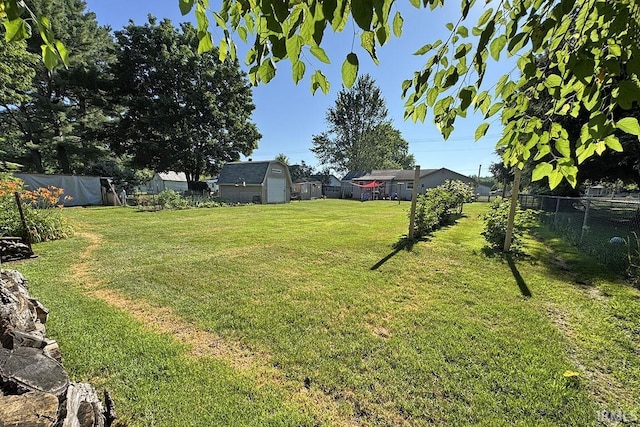 68615 County Road 23, New Paris, IN 46553 - fenced backyard with a shed