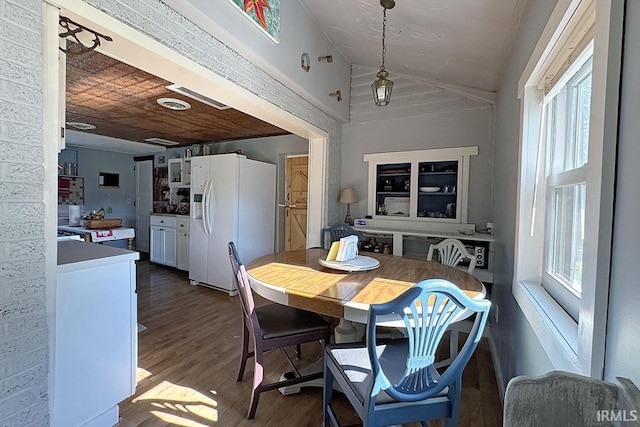 68615 County Road 23, New Paris, IN 46553 - dining space featuring wood finished floors and lofted ceiling