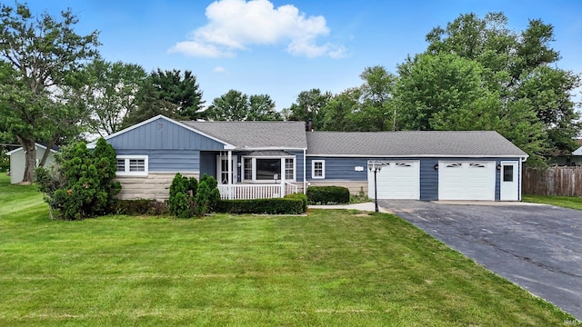 58 W Markle Rd, Huntington, IN 46750 - ranch-style home featuring a garage and driveway