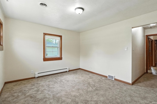 58 W Markle Rd, Huntington, IN 46750 - unfurnished room with a baseboard radiator and carpet floors