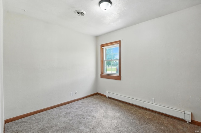 58 W Markle Rd, Huntington, IN 46750 - carpeted empty room with a baseboard heating unit and baseboards