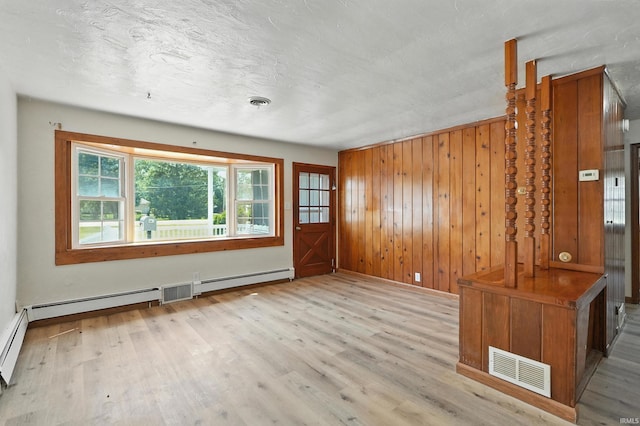 58 W Markle Rd, Huntington, IN 46750 - empty room with wood finished floors and wood walls