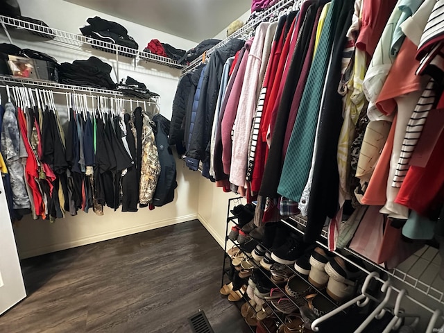 2939 Charlestown Ct, Evansville, IN 47725 - walk in closet featuring wood finished floors