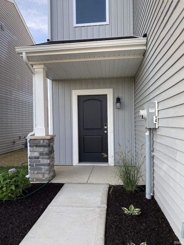 3607 Canal Square Dr Unit 2, New Haven, IN 46774 - entrance to property with board and batten siding and a porch