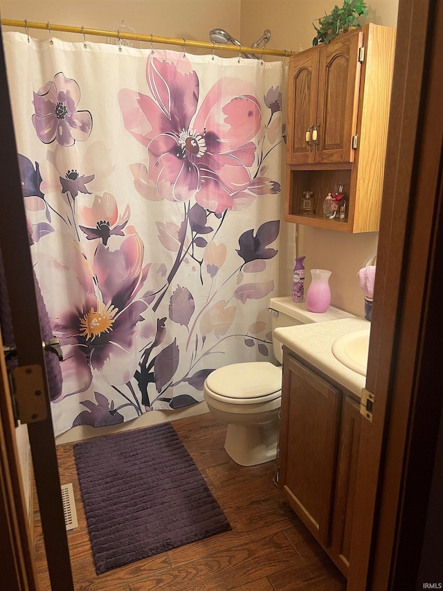 3718 George Washington Rd, Lafayette, IN 47909 - full bathroom with vanity, wood finished floors, and curtained shower