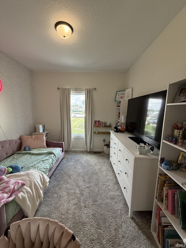 12788 Kingfish Ct, Middlebury, IN 46540 - bedroom featuring light colored carpet and a textured ceiling