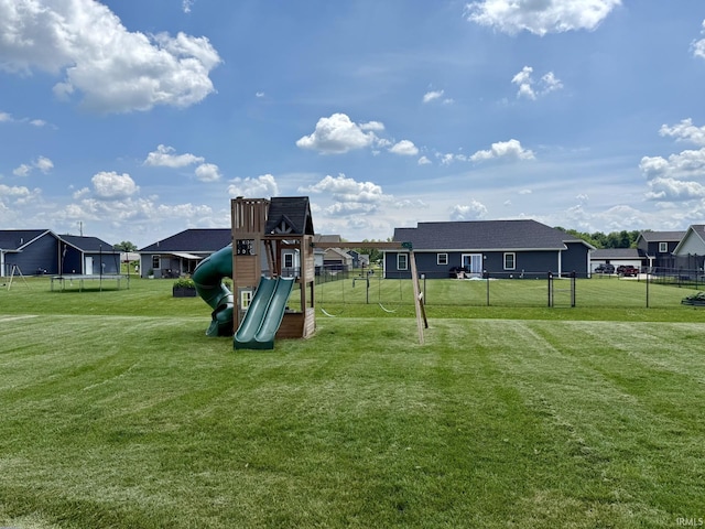 12788 Kingfish Ct, Middlebury, IN 46540 - community play area featuring a trampoline and a residential view