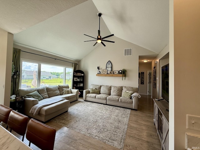 12788 Kingfish Ct, Middlebury, IN 46540 - living room featuring wood finished floors, ceiling fan, and high vaulted ceiling