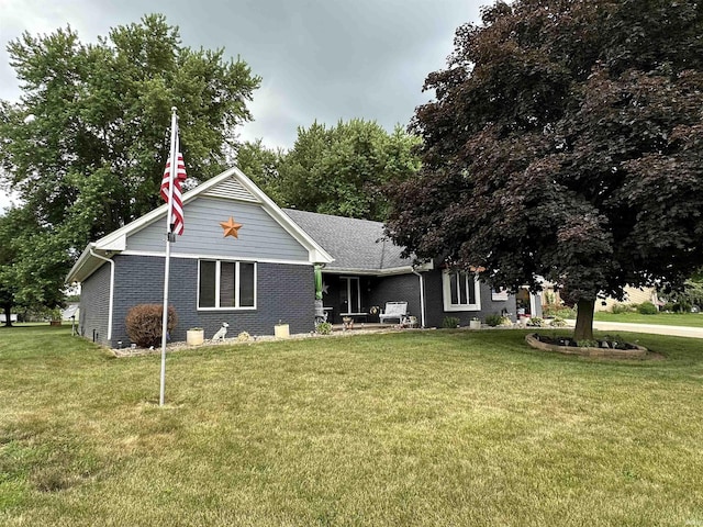 1701 Fairway Dr, Kokomo, IN 46901 - view of front of house with a front lawn and brick siding