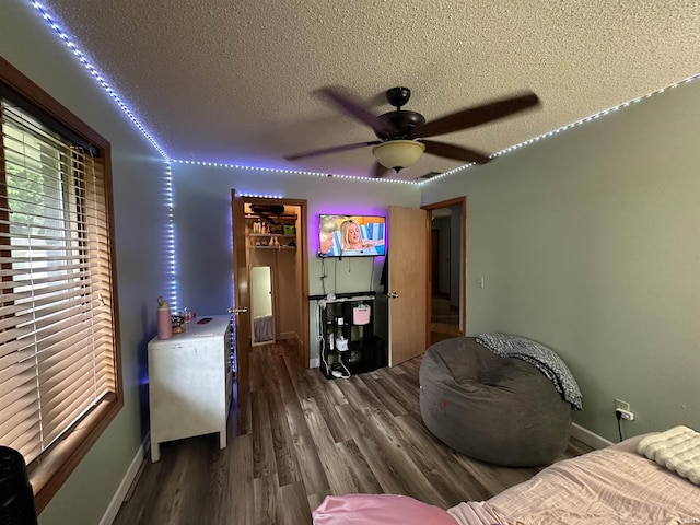 1701 Fairway Dr, Kokomo, IN 46901 - bedroom featuring a textured ceiling, wood finished floors, and a ceiling fan