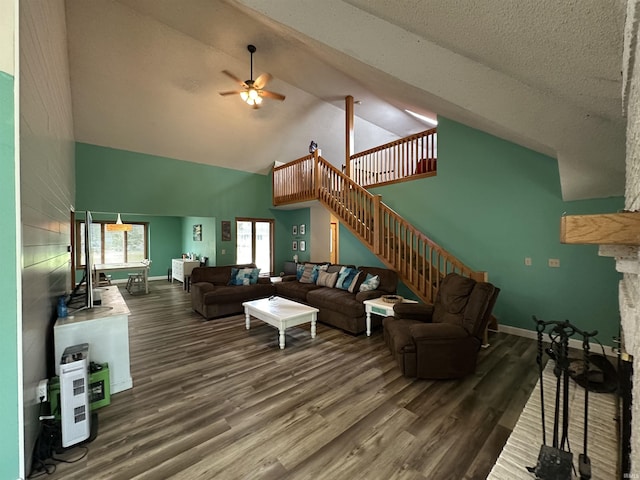 1701 Fairway Dr, Kokomo, IN 46901 - living area with ceiling fan, high vaulted ceiling, wood finished floors, and stairs